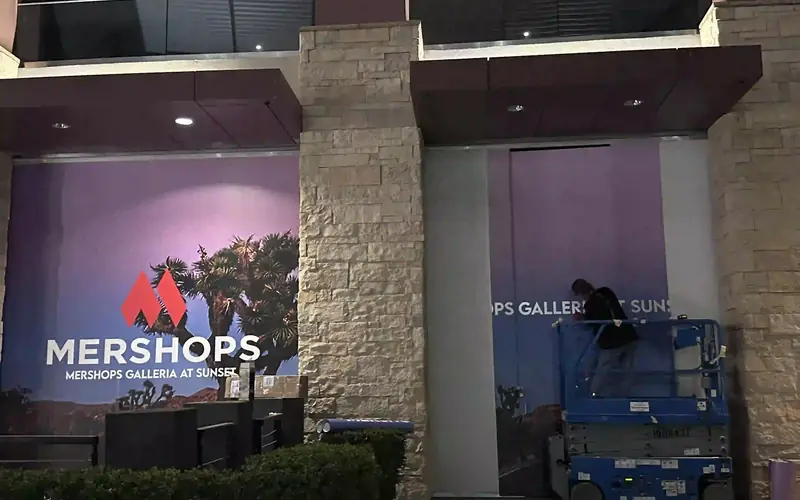 Mershops Galleria at Sunset exterior building wrap installed by Solid Promo Prints